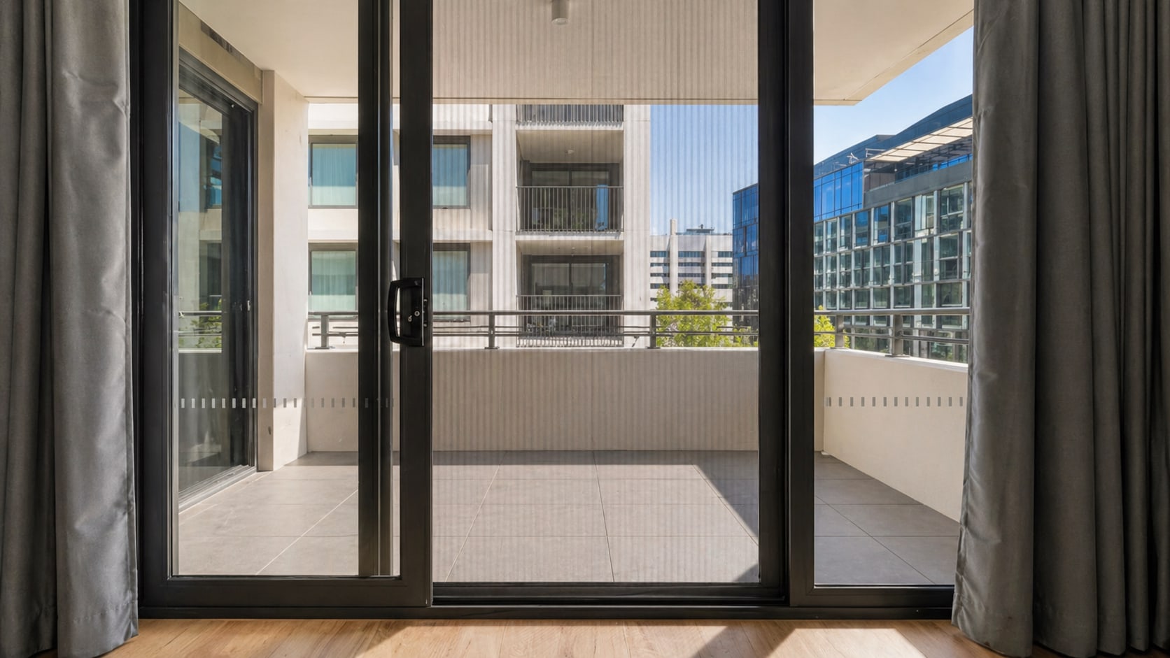 Custom fly screen installation allowing airflow through a residential opening