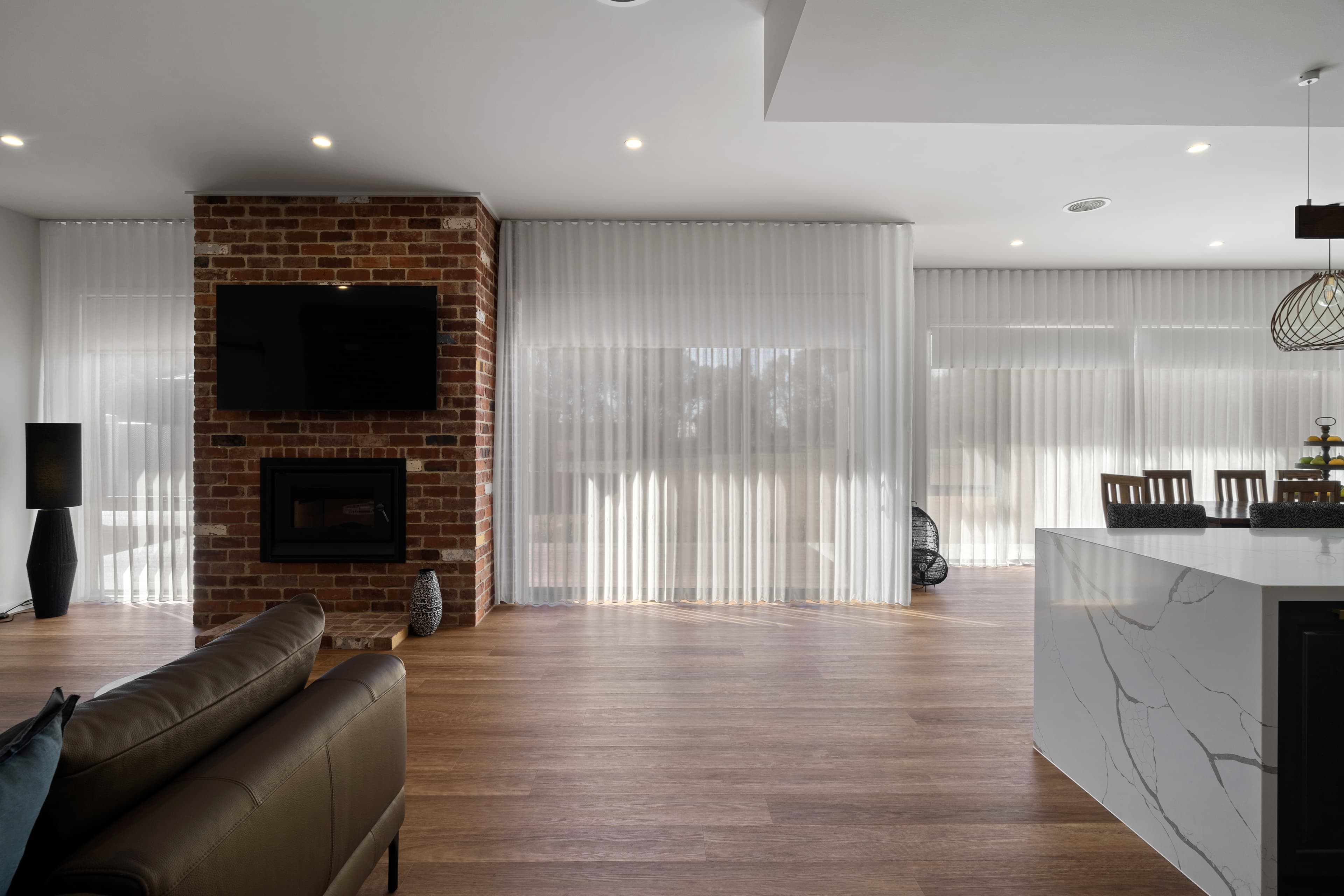 Deakin House - sheer curtains and roller blinds